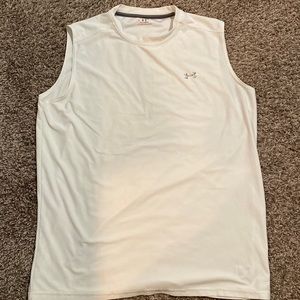Sleeveless Under Armour white tee.